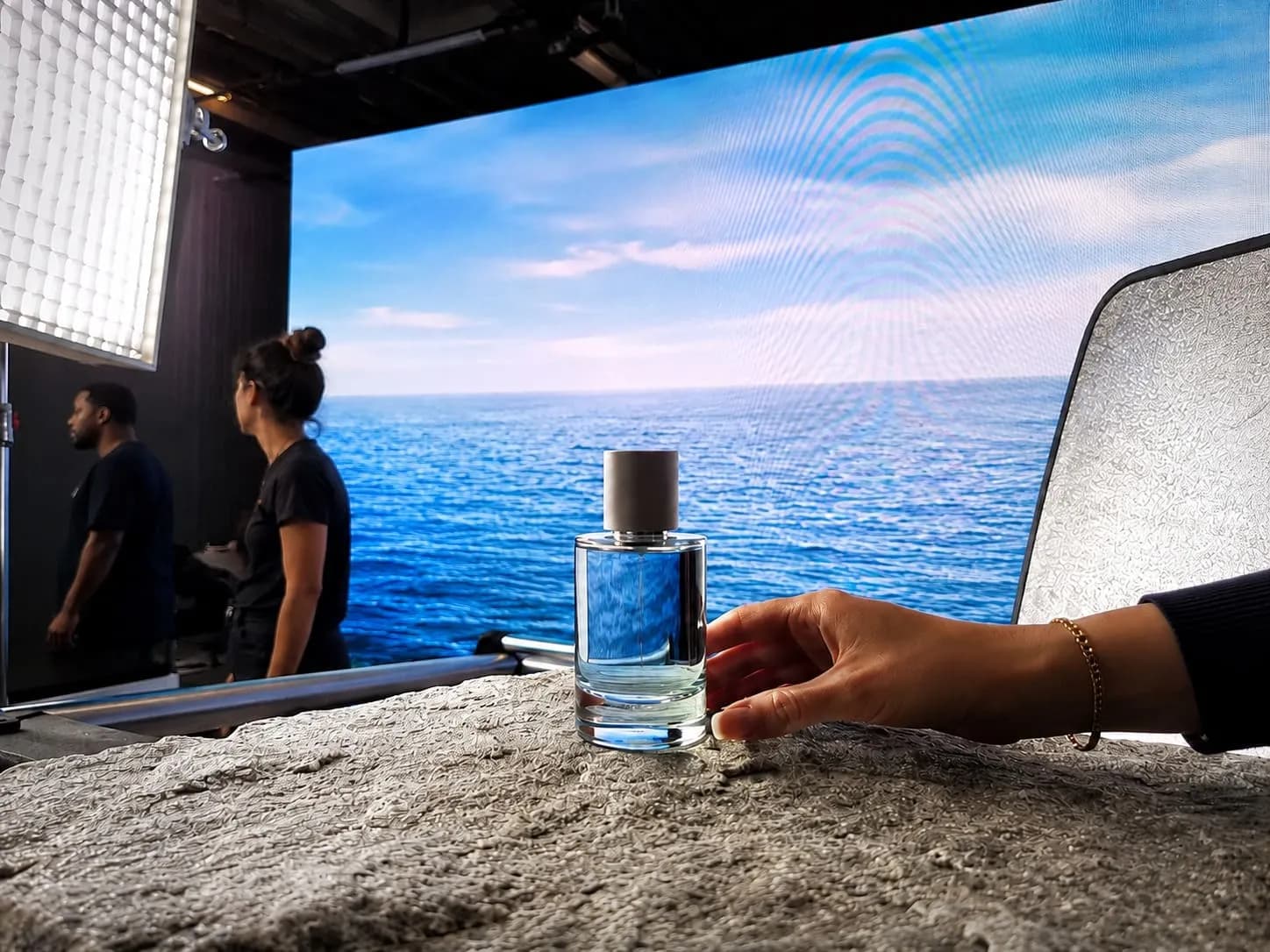 A large LED volume displaying a seascape for a perfume advert