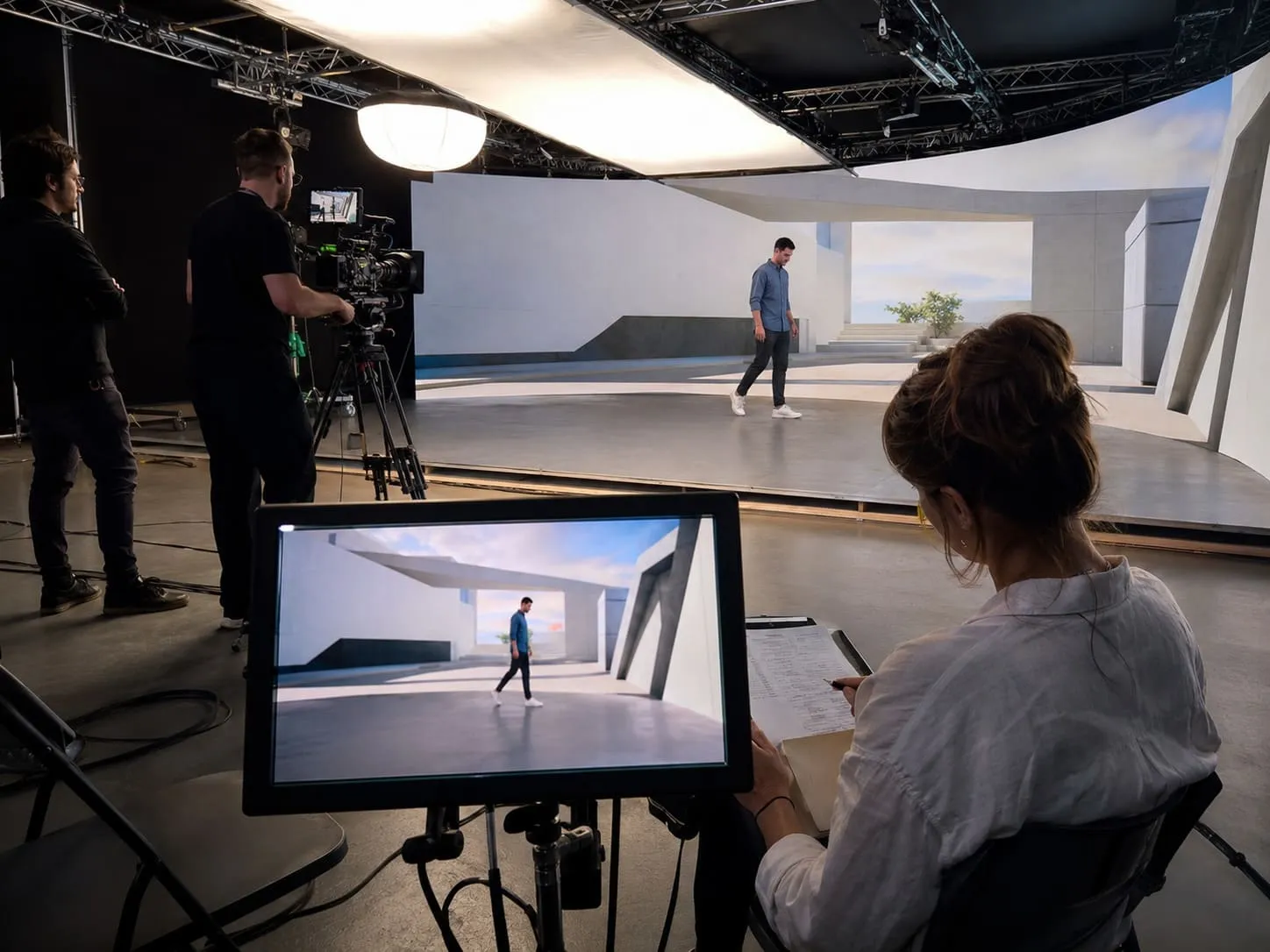 A busy virtual production studio team filming