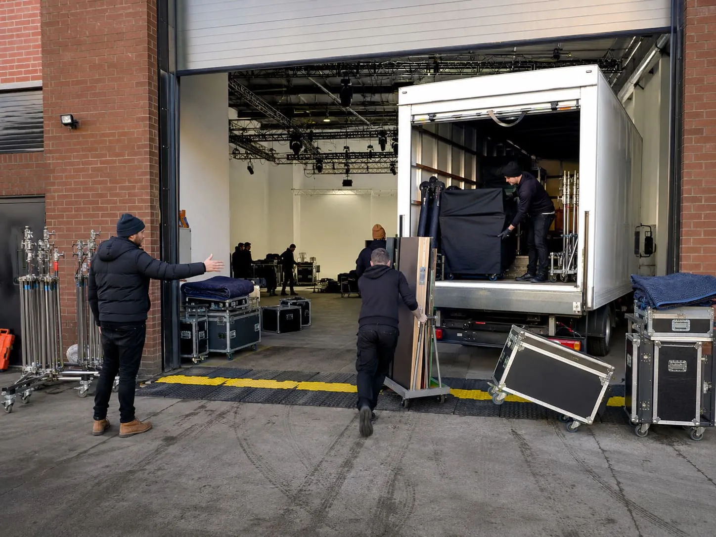 A film crew unloading their equipment on day one