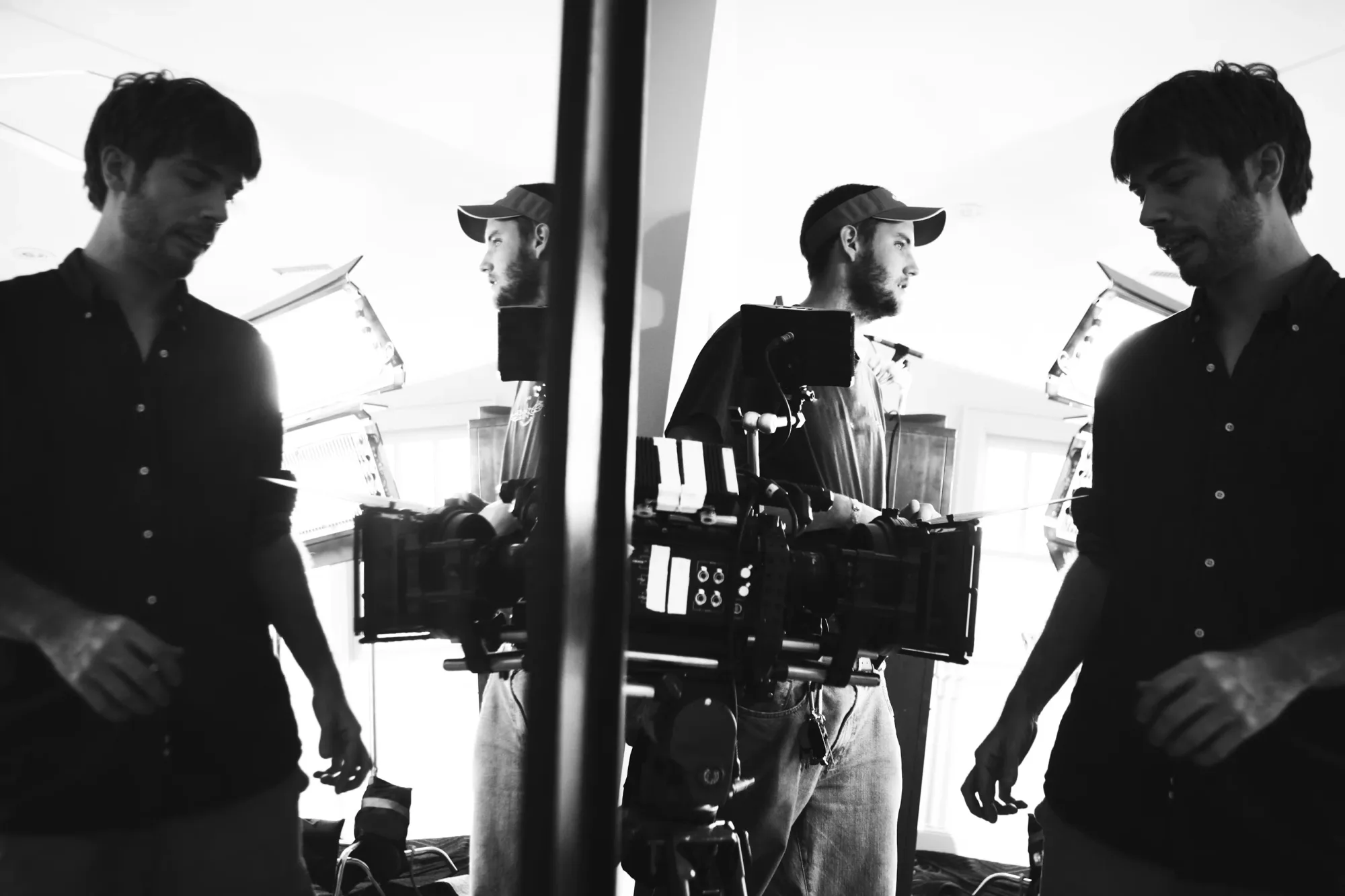 A videographer crew shooting a production in a film studio