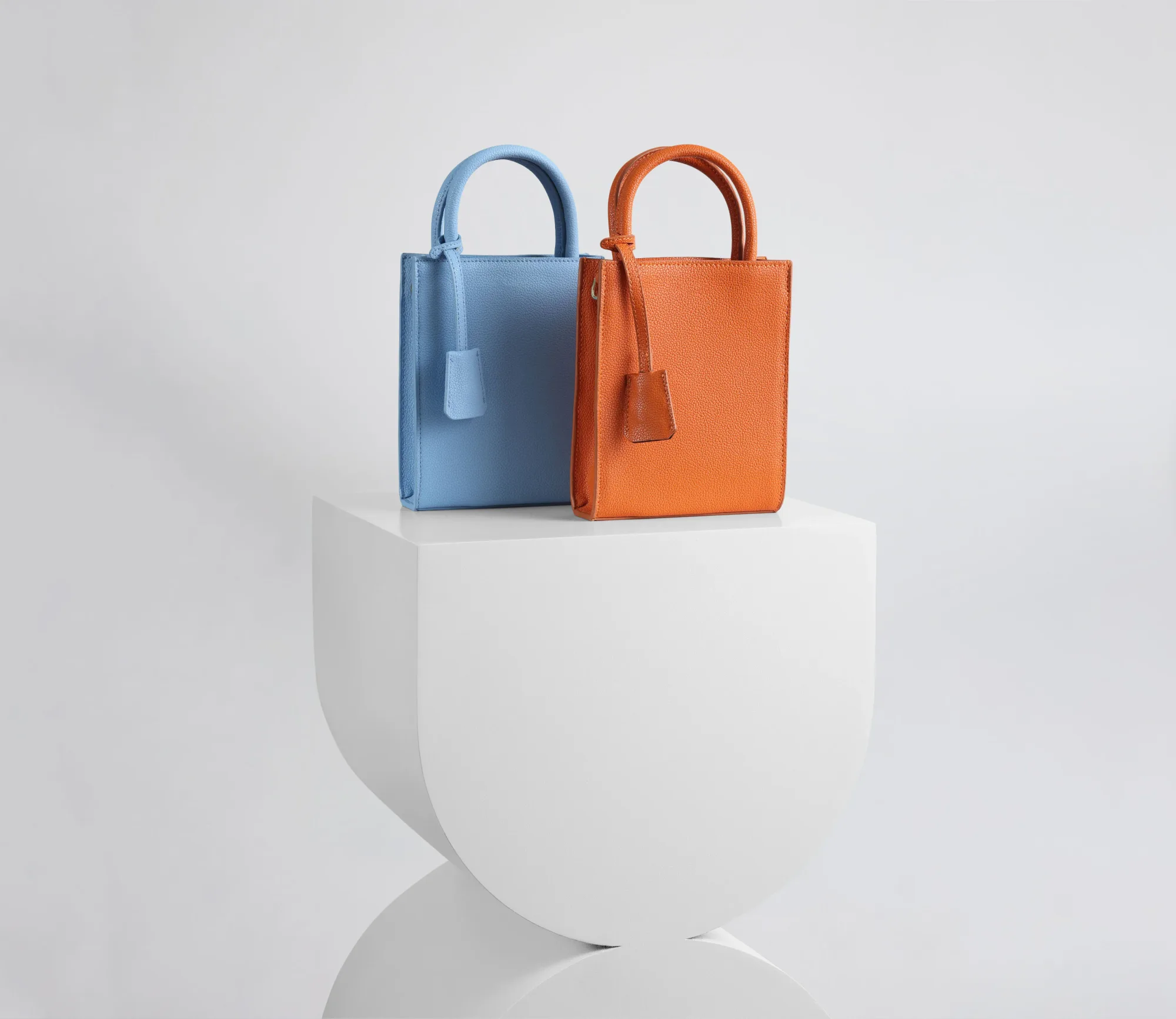 Luxury handbags at a photo shoot in a production studio